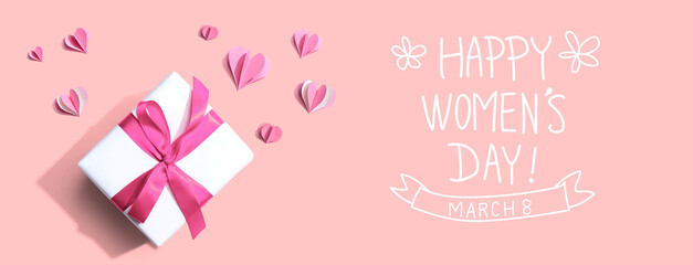 Wall Mural - Happy women's day message with a gift box and paper hearts