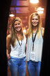 © Alexandra/peopleimages.com - Two young women with backstage passes at a concert. This concert was created for the sole purpose of this photo shoot, featuring 300 models and 3 live bands. All people in this shoot are model