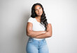 © Louis-Paul Photo - Studio portrait of beautiful brunette young dark-skinned woman,