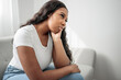 © Louis-Paul Photo - Stressed miserable black woman suffer from grief problem, depressed lonely upset african girl crying alone on sofa