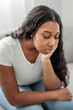 © Louis-Paul Photo - Stressed miserable black woman suffer from grief problem, depressed lonely upset african girl crying alone on sofa