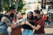 © Zamrznuti tonovi - Group of friends drinking cocktails and having fun at music festival