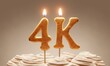 Milestone cake celebrating 4000 followers or subscribers. Golden ‘4k’ number candles on cake with icing in neutral tones. 3D rendering