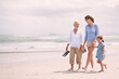 © Duncan M/peopleimages.com - Enjoying a girls day out. Portrait of a woman with her daughter and mother at the beach.