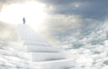 Stairway To Heaven. Shot Of A Man On A Stairway Leading Up To Heaven.