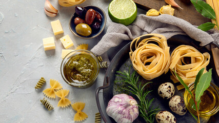 Sticker - Italian pasta assortment on light background.