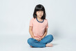 © waranyu - Asian girl meditating on white background, lovely kid