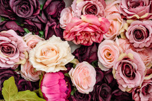 Closeup Texture Of Bright Colorful Artificial Synthetic Roses