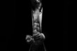 © ivan - Man with a naked torso on a black background
