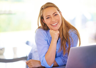 Poster - Check out my blog sometime. Portrait of a young woman sitting with her laptop at home.