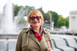 © DariaTrofimova - Elderly russian woman walking in   park.