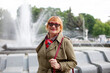 © DariaTrofimova - Elderly russian woman walking in   park.