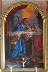 Wall Mural - St. Joseph holds the child Jesus, altar of St. Joseph in the Church of Our Lady of Dol in Dol, Croatia