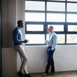 © D Laflor/peopleimages.com - Id like us to explore some of your ideas further. Shot of two businessmen having a discussion in an office.