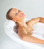 This is so relaxing. Portrait of a stunning young woman relaxed in her bubble bath.