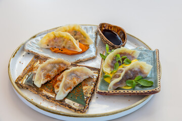 Poster - Appetizing fried dumplings Gyoza with soy sauce