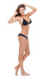 © Marius Venter/peopleimages.com - Flirting with the camera. Studio portrait of a gorgeous young woman smiling while posing in bikini against a white background.