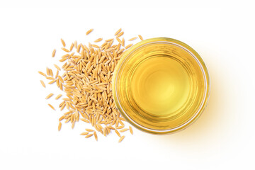 Sticker - Rice bran oil extract with paddy unmilled rice isolated on white background. Top view. Flat lay.