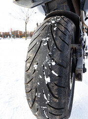 Canvas Print - Closeup of the dirty tire of a motorcycle