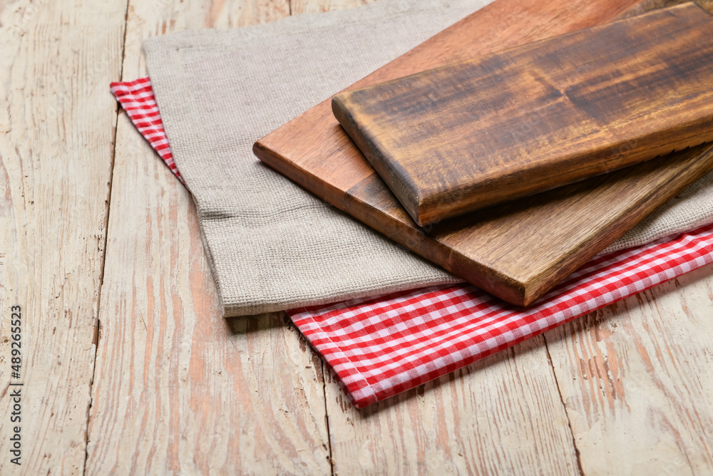 Cutting boards on wooden  background
