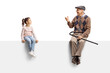 © Ljupco Smokovski - Grandfather sitting on a blank panel and talking to a little girl