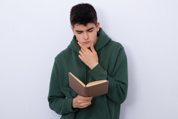 Sticker - isolated boy with book on white background