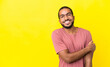 © luismolinero - Young latin man isolated on yellow background laughing
