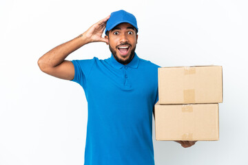 Poster - Delivery Ecuadorian man isolated on white background with surprise expression