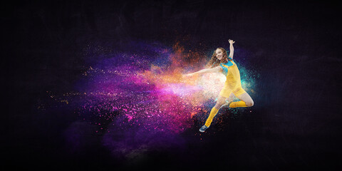 Wall Mural - Young woman jumping in the air