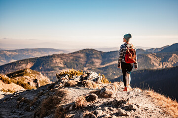 traveler hiking with backpacks. hiking in mountains. sunny landscape. tourist traveler on background