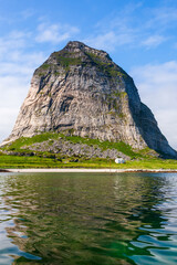 Wall Mural - Traenstaven a mountain peak at Sanna island in Norway