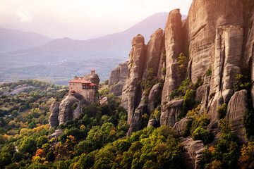 Wall Mural - Holy Monastery of Saint Nicholas Anapafsas on a rock cliff at Meteora. Travel and pilgrim must visit places in Greece