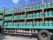 A photo of a truck loaded with gas steel containers in Paka, oil and gas processing station