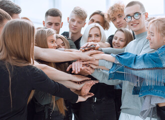 Wall Mural - large group of young people showing their unity