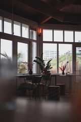 Poster - A perspective shot of an interior with panoramic windows.