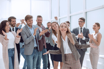 Wall Mural - creative business team applaud the young businesswoman