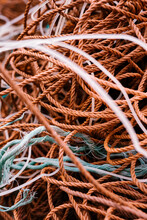 Tangled Fishing Nets In Rippling River