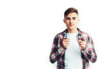 young handsome teenage hipster guy posing emotional, happy smiling against white background isolated, lifestyle people concept