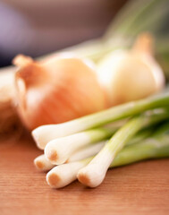 Wall Mural - Get ready for a hearty meal. Shot of various types of onions lying on a countertop..