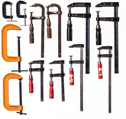 Carpentry clamps of different sizes on an isolated background.