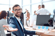 © ASDF - successful businessman inviting you to his office