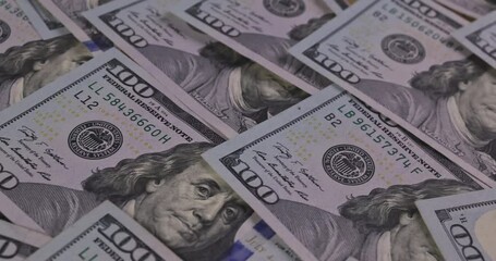 Wall Mural - American cash banknotes with one hundred US dollar money close-up on a table