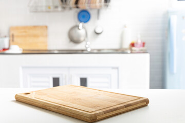 Wall Mural - empty wooden chopping block, placed on a table, retro kitchen background / area for you to edit the product