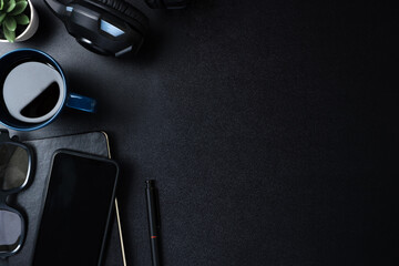 Poster - top view working desk with keyboard headphone and mobile phone on black table background