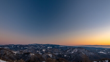 Wall Mural - Winter sunset in the hills of Slovenia