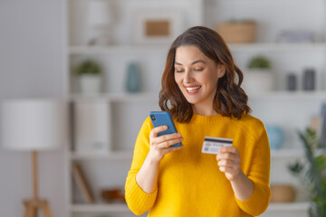 Woman is doing online purchases