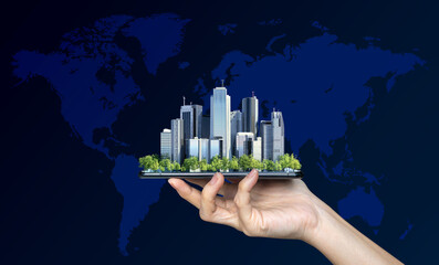 Poster - A businessman showing modern city miniature with tree on smart phone screen