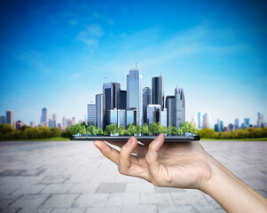 Poster - Businessman hand lifting smart city with mobile phone.