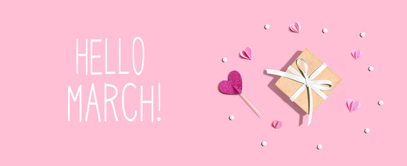 Wall Mural - Hello March message with a small gift box and paper hearts