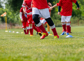 Wall Mural - Young soccer players running